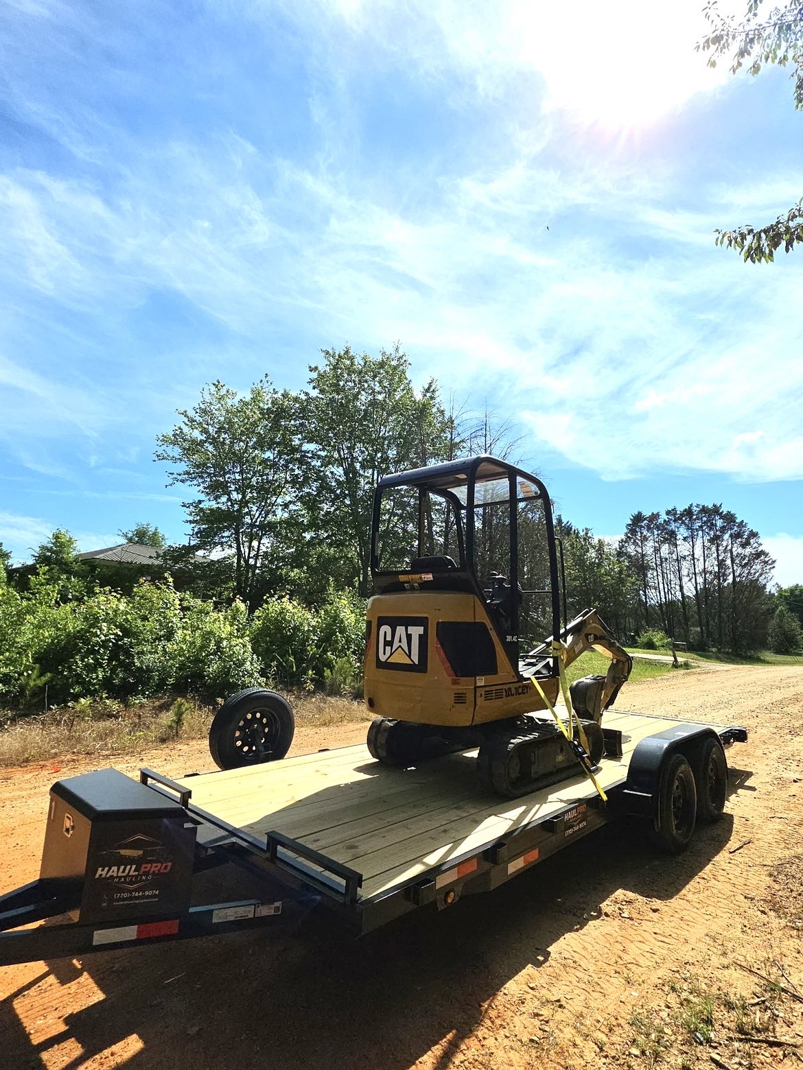 Haul Pro Hauling 20ft car hauler trailer loaded and ready
