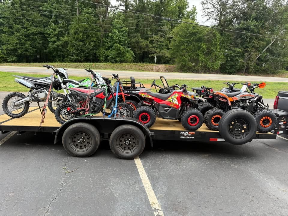 Haul Pro Hauling trailer loaded with dirt bikes and ATVs for transport